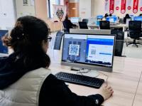 左帮右办添“新”意 便民办税增“新”彩